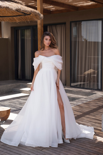 Buy Caprice Natalia Romanova's wedding dress from the 2024 collection at the Mary Trufel boutique