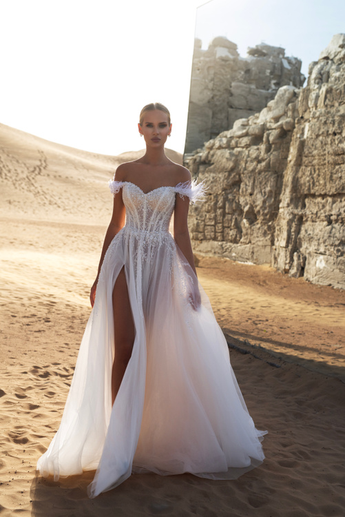 Wedding dresses with feathers